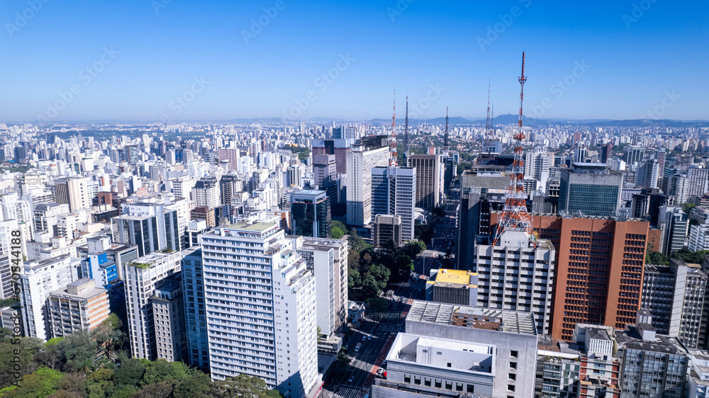 Fototapeta premium Aerial view of Avenida Paulista in Sao Paulo, Brazil. Very famous avenue in the city. High-rise commercial buildings and many residential buildings