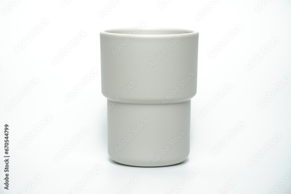 Plastic mug of different colors isolated on white, Clipping path included. Plastic mug of different colors isolated on white, Clipping path included.