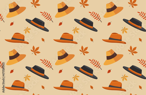 seamless background with autumn hats and leaves