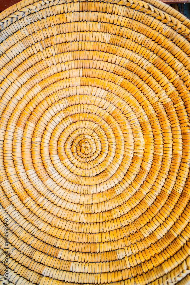 Fototapeta premium background of bamboo branches fence wicker basket straws