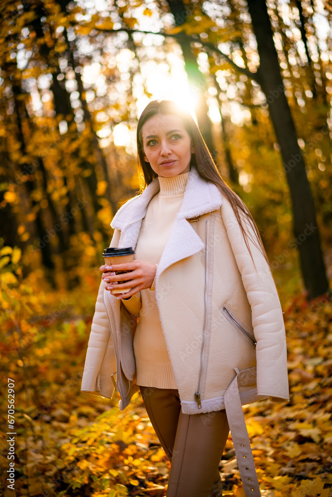 A woman standing in a forest holding a cup of coffee. A Serene Morning in the Enchanted Woods A woman standing in a forest holding a cup of coffee. A Serene Morning in the Enchanted Woods