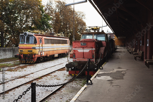 Fototapeta Naklejka Na Ścianę i Meble -  Old train on train rails  in the dead end railway station