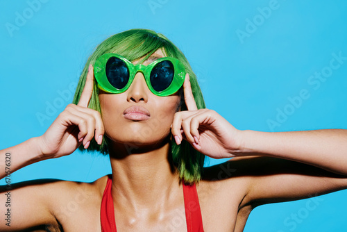 Woman sunglasses swimsuit wig beauty trendy green portrait smile retro summer eyes fashion