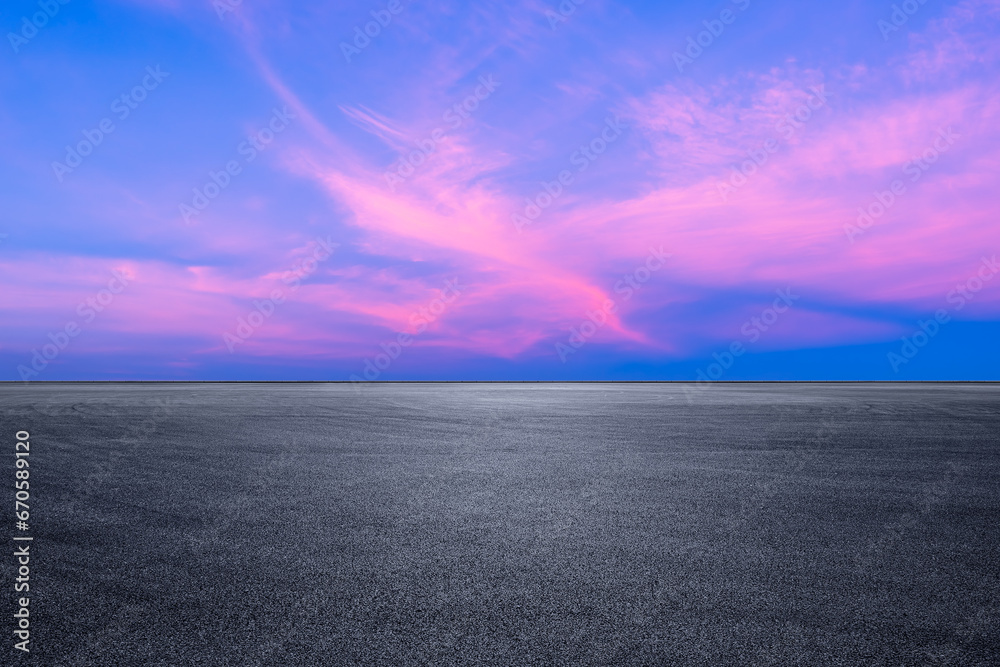 Asphalt road platform and pink sky clouds landscape at sunset - obrazy, fototapety, plakaty 