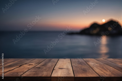 Empty Wooden Table with Blurred Ocean and Island Background at Dawn or Dusk