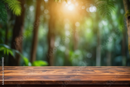 Empty Wooden Table with Bokeh Sun Flare Light and Blurred Tropical Forest Jungle Background