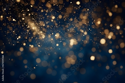 An Abstract Background Adorned with Gold Stars, Particles, and Sparkling Effects Set on a Deep Navy Blue Canvas. A Captivating Visual for Christmas and New Year Celebrations photo