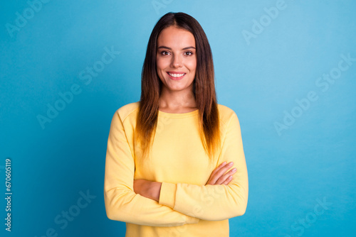 Young smiling happy fun confident woman 20s in casual shirt white t-shirt hold hands crossed folded isolated on color background studio portrait. People lifestyle concept