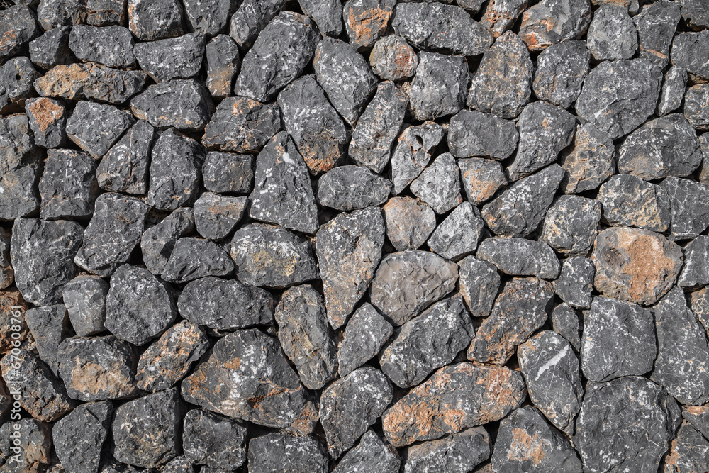 Flat lay photograph of a colorful stone wall. Stone background texture Flat lay photograph of a colorful stone wall. Stone background texture