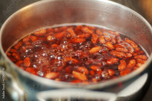 Beans are soaked in a pot for further cooking. Cooking, healthy nutrition, vegan food