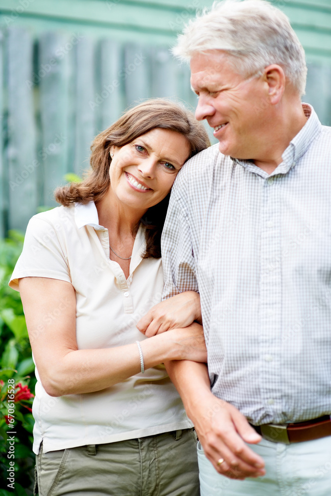Senior couple, arm or love with support in marriage, care or wife smile on face in commitment family security. France, mature man or woman with gratitude, embrace or happy together in garden backyard Senior couple, arm or love with support in marriage, care or wife smile on face in commitment family security. France, mature man or woman with gratitude, embrace or happy together in garden backyard