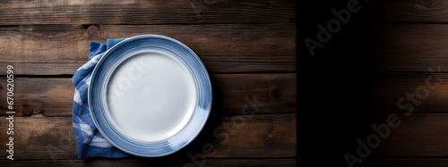 A white plate with a blue rim stands on a wooden table. AI Generated