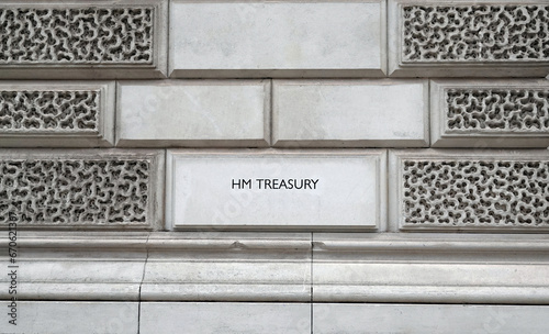 HM Treasury sign on the wall of a government building in London, UK.  photo