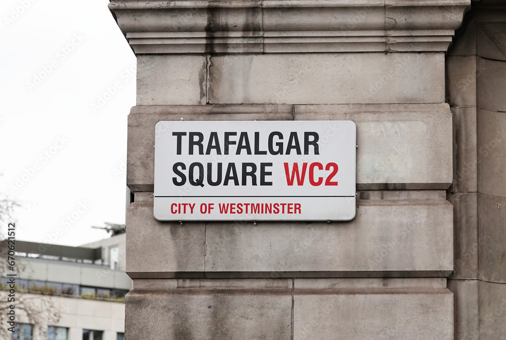Trafalgar Square street sign on a wall in Westminster, London, UK. Trafalgar Square street sign on a wall in Westminster, London, UK.