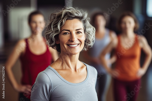Active Lifestyle Embraced Middle-Aged Woman and Friends Express Their Passion for Sports in a Fitness Studio. created with Generative AI © photobuay
