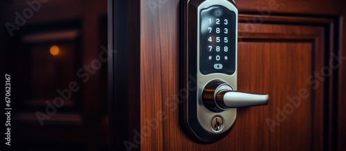 Digital keypad access on a wooden hotel or apartment door.