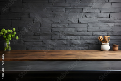 Wooden countertop of a modern kitchen with dark tiles on the wall with empty space for presentation and text photo