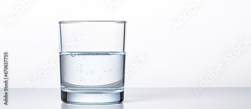 Clear glass of water on white background