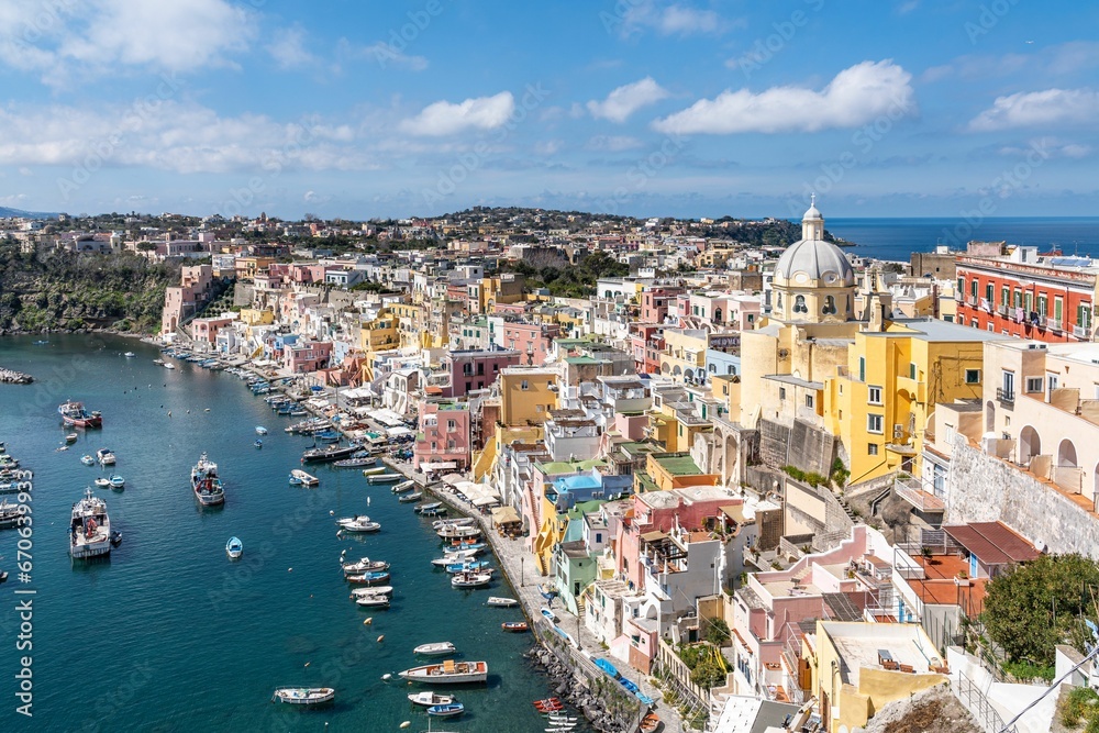 Stunning coastline of the port of Corricella in Procida, famous for its vibrantly colorful housing