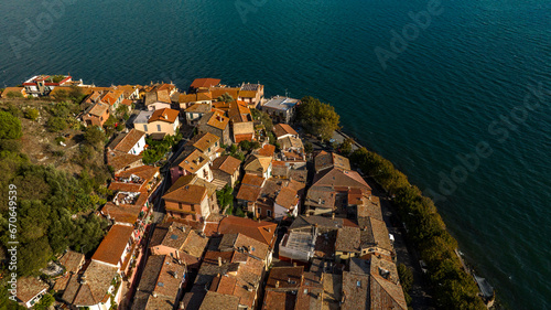 Aerial view of the sloping roofs of the houses in the historic center of Trevignano Romano, in the metropolitan city of Rome, Italy. The town is located on the volcanic Lake Bracciano. photo