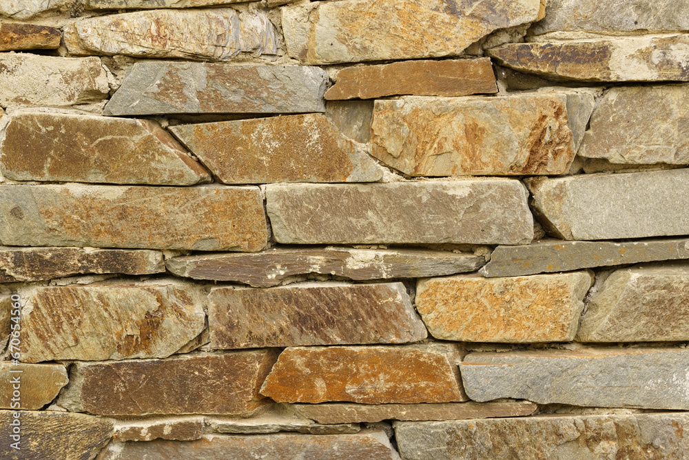 Texture of an old stone wall made of stone. Texture of an old stone wall made of stone.