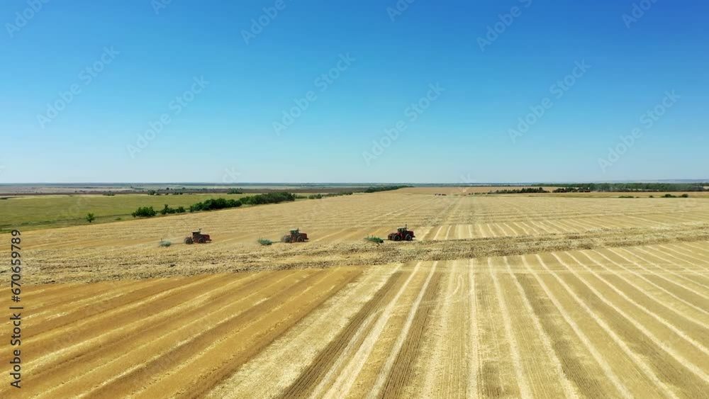 HD. Tractor with a sowing complex works in the field HD. Tractor with a sowing complex works in the field