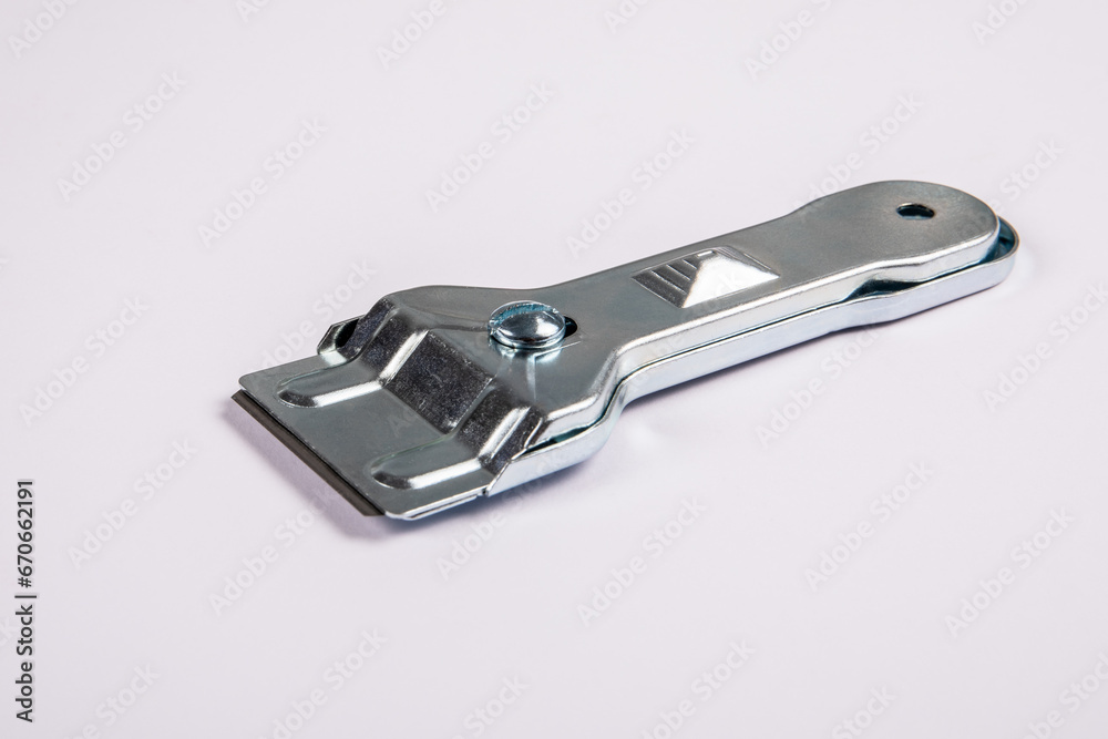 Glass ceramic scraper on a white background Glass ceramic scraper on a white background