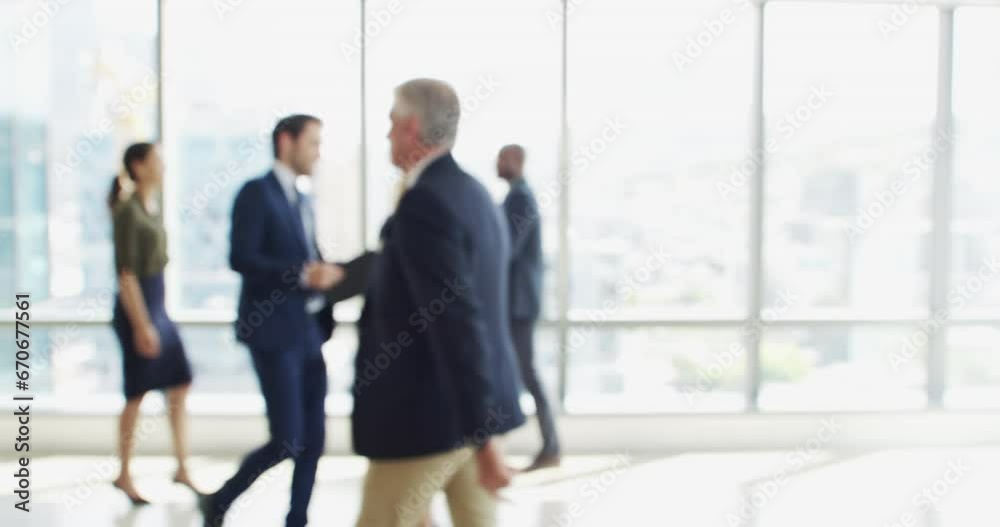 Blur, corporate and walking with business people in office for company or professional work on the go. Movement, workers or team of employees or group in the workplace together, moving for growth Blur, corporate and walking with business people in office for company or professional work on the go. Movement, workers or team of employees or group in the workplace together, moving for growth
