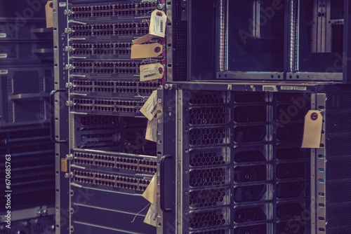 Marked and stored empty server cabinet after decommissioning 