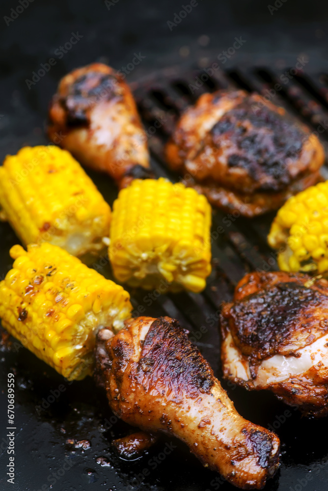 Chicken legs with grilled corn.style rustic Chicken legs with grilled corn.style rustic