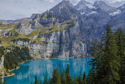  Oeschinensee, often referred to as Oeschinen Lake, is a picturesque alpine lake nestled in the Swiss Alps.