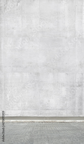 a fragment of a street city concrete wall of a building and an paving stones. Building's facade. Mocap or background for creativity