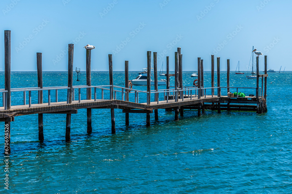 A view down a jetty on the waterfront of Walvis Bay, Namibia in the dry season