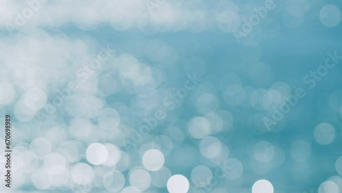 Turquoise Ocean Boiling With Foamy Waves. Sea Waves Crashing. Bokeh. Blur.