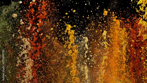 Super Slow Motion Shot of Colorful Explosion of Various Spices on Black Background at 1000fps.