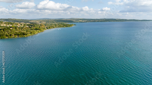 Aerial view of Lake Bracciano  originally also called Lake Sabatino. It is a lake of volcanic and tectonic origin  located in the metropolitan city of Rome and surrounded by the Sabatini Mountains.