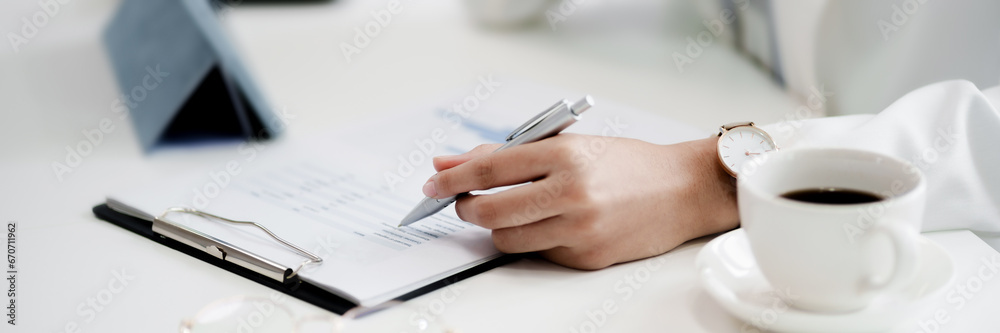 Business investor analyzing a valuation data forecast a investment project.. Business investor analyzing a valuation data forecast a investment project..
