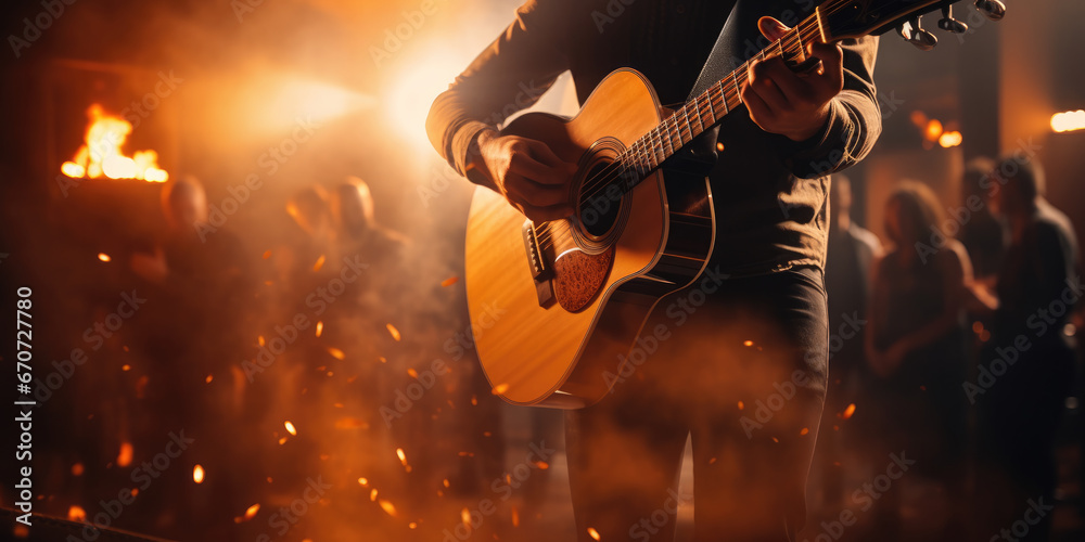 Close-up of acoustic guitar being played in concert setting - obrazy, fototapety, plakaty 