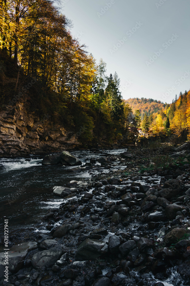 Mountain river among the autumn forest Mountain river among the autumn forest