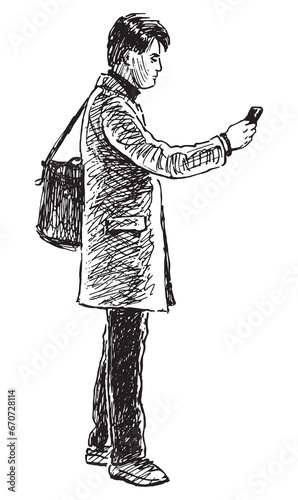 Sketch of young city dweller standing on street and looking at smartphone