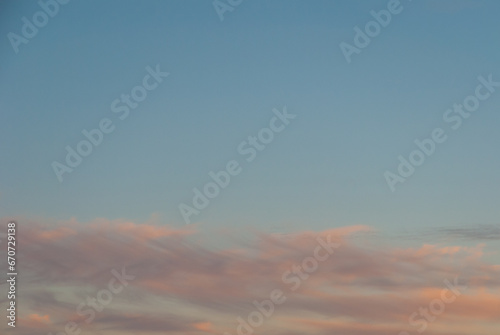 Evening sky with pink clouds.Beautiful background. © Ruslan