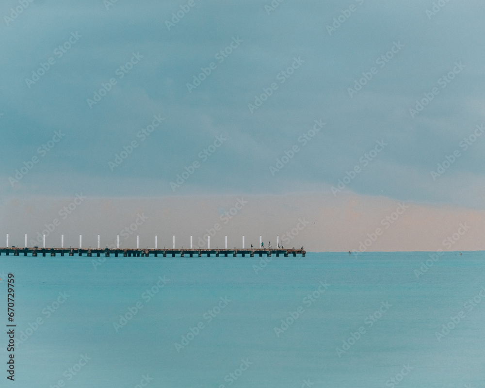 Tranquil pier over calm sea at Playa Del Carmen, Mexico