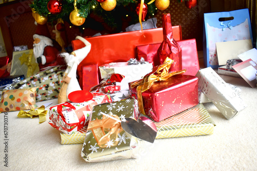 Multi Presents and gift boxes under the Christmas tree during the Christmas holiday.