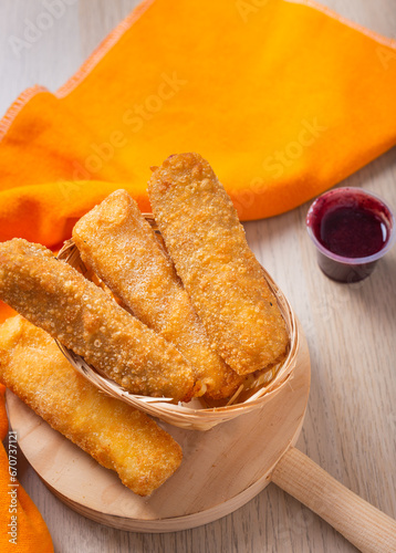 Venezuela Tequeños Food Cheese Stick, with traditional sauce photo