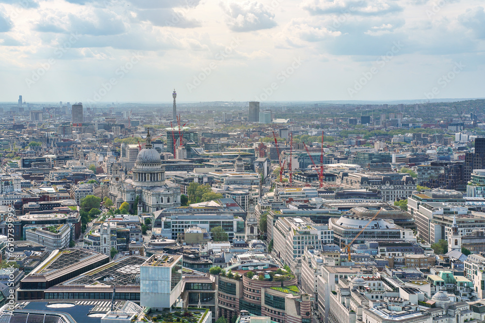 Aerial view of west London on a sunny day, classic St. Pauls cathedral amongst many modern buildings
