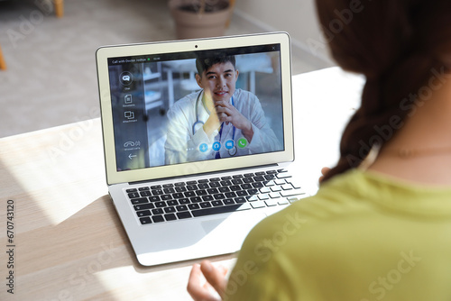 Young woman video chatting ...