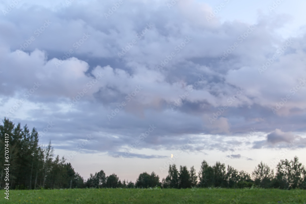 Countryside landscape with green fields and sunset sky in Latvia. Countryside landscape with green fields and sunset sky in Latvia.