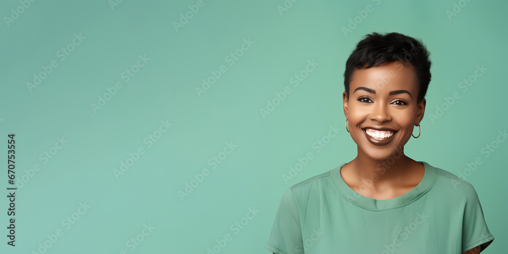 Smimilg young woman with dark skin and short groomed hair isolated on flat green pastel background with copy space. Model for banner of cosmetic products, beauty salon and dentistry Smimilg young woman with dark skin and short groomed hair isolated on flat green pastel background with copy space. Model for banner of cosmetic products, beauty salon and dentistry