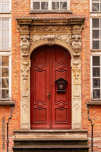 Carved wooden old door and porch