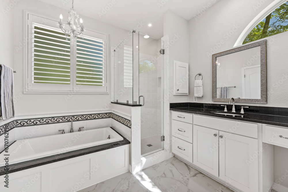 a home bathroom with a tub a home bathroom with a tub